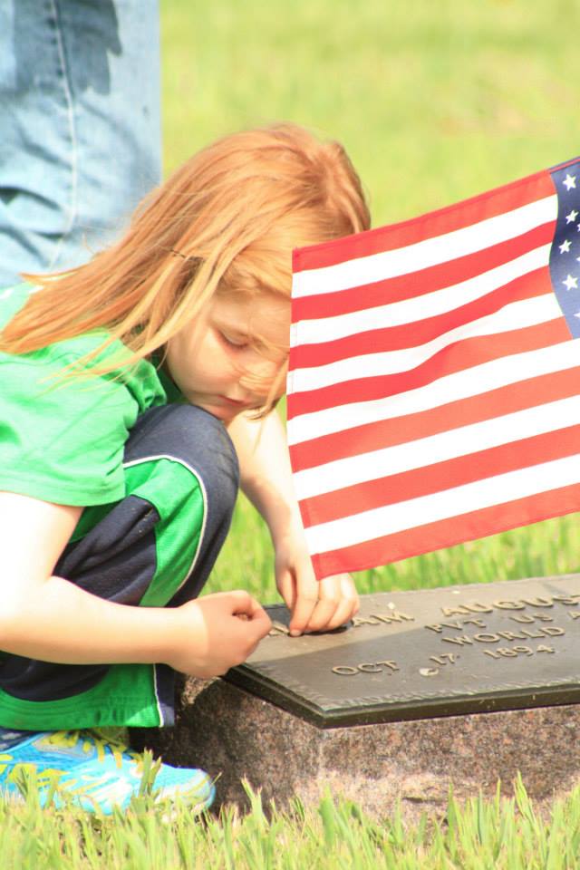 Child at grave